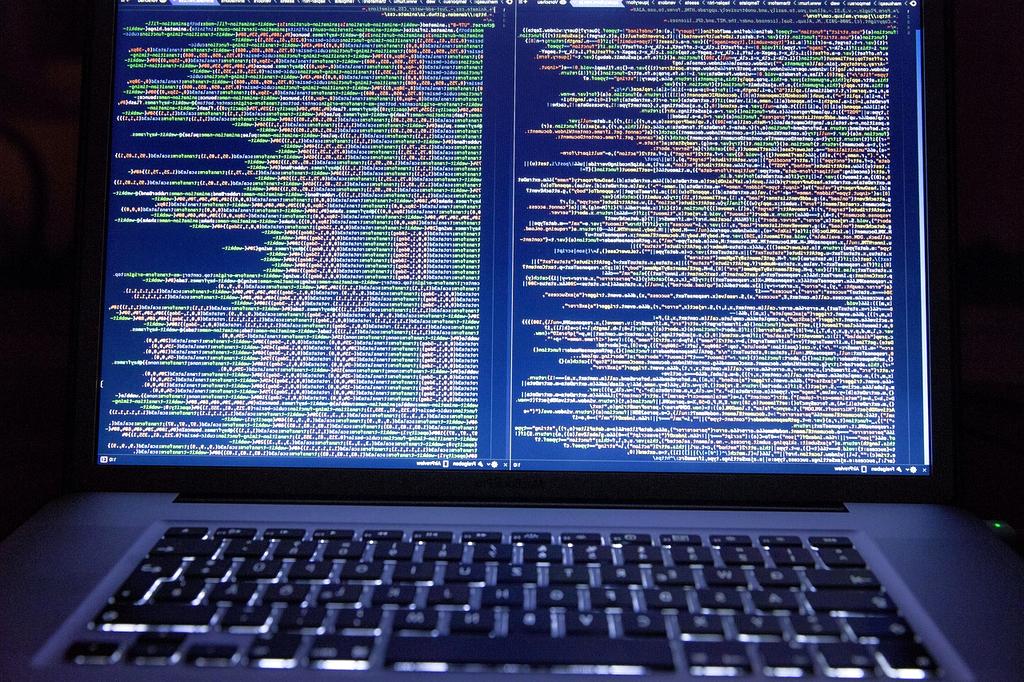 Laptop with network coding on screen